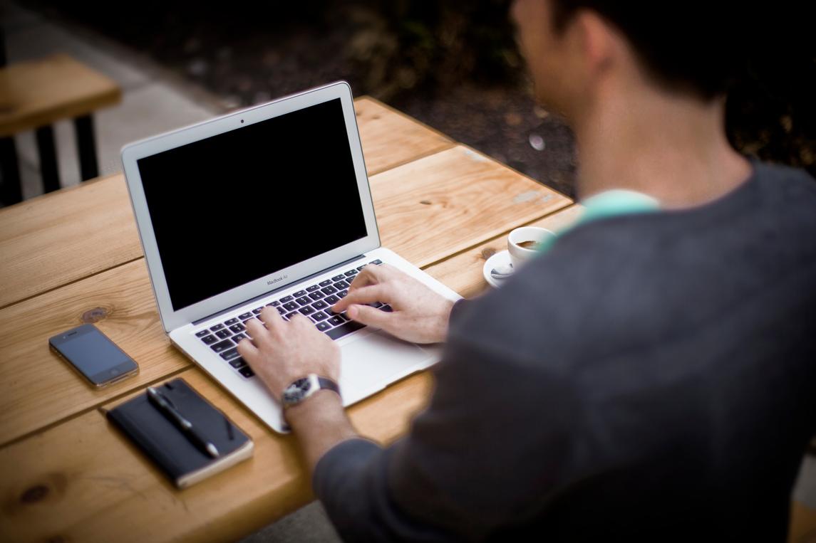 man working on laptop