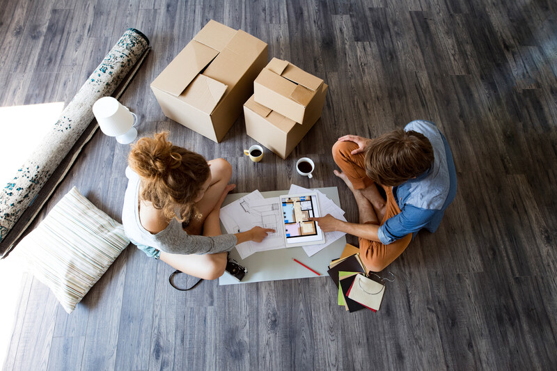 couple discussing selling a house