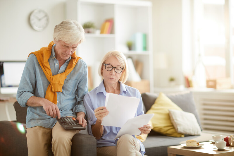 older couple making calculations
