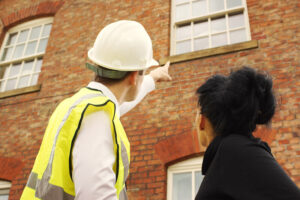 surveyor assessing property